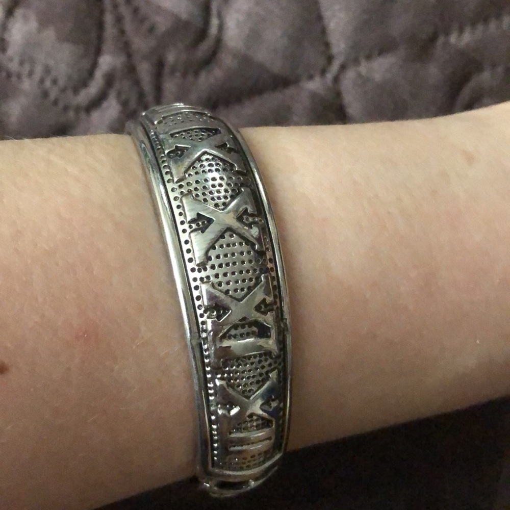 Silver tone bangle. With numbers from 1 to 10.